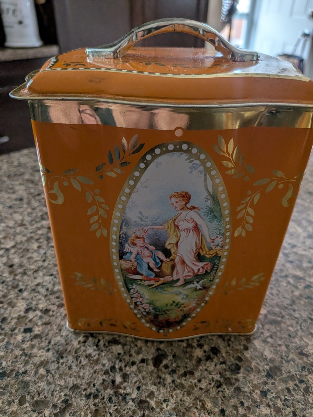 Vintage Decorative Orange Biscuit Tin with Woman And Cherub Scene